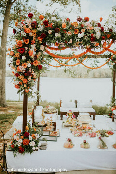 Outdoor Ceremony Mandap with Orange and Red Floral Decor