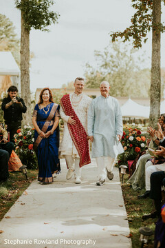 Groom in Sherwani and Shawl Walking Down Aisle
