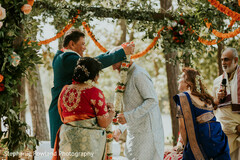 Outdoor Ceremony with Floral Arch and Garlands
