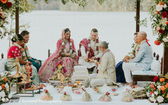 Outdoor Mandap Wedding Ceremony by Lake with Floral Decor