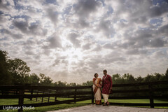 Couple's Outdoor Photo Session with Dramatic Sky