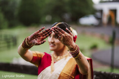 Bride's Hands with Intricate Mehndi and Bangles