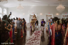 Groom's Baraat Entrance on Horseback with Rose Petal Aisle