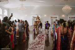 Groom's Baraat Entrance on Horse with Guests in Grand Ballroom