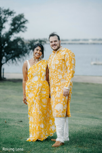 haldi ceremony,yellow outfits,couple portraits,waterfront,pre wedding rituals,coordinated attire,candid smiles,haldi fashion,south asian wedding,outdoor portraits