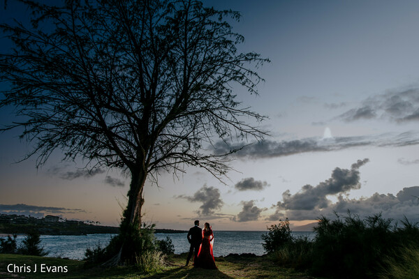 sunset portraits,silhouette,oceanfront wedding,twilight romance,destination wedding,beach wedding,couple portraits,scenic landscape,evening sky,south asian wedding