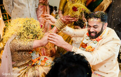 Couple Showered with Yellow Petals