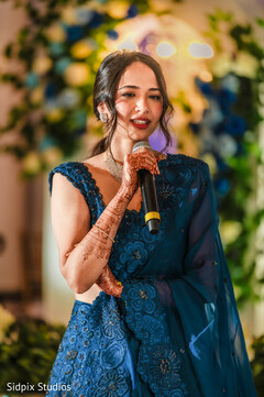 Woman in Teal Sari with Mehndi and Diamond Jewelry