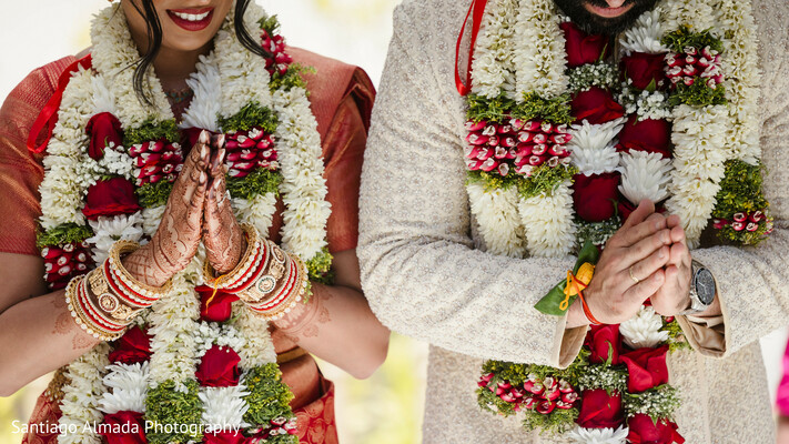 mehndi,bangles,floral garlands,hands