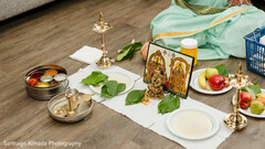 Ritual Setup with Brass Lamps and Offerings