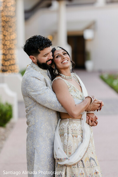 couple portrait,white lehenga,sherwani,bridal jewelry,groom fashion,wedding attire