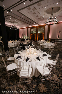 Elegant Black and White Reception Decor with Ghost Chairs