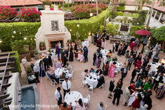 Courtyard Reception with String Lights and Fireplace