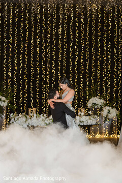 Romantic Dance Amidst Twinkling Lights and Dreamy Fog