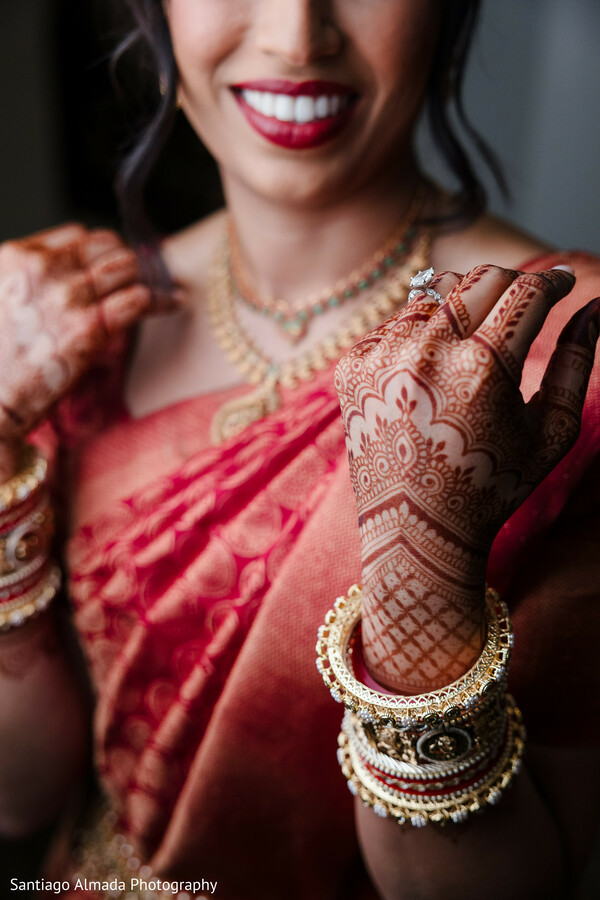 bridal mehndi,red sari,bridal bangles,bridal jewelry,wedding details,getting ready,bridal fashion,mehndi artists,bride