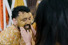 Groom's Pre-Wedding Ritual with Yellow Paste and Embroidered Kurta