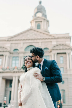 Groom's Tender Kiss During Outdoor Photo Session