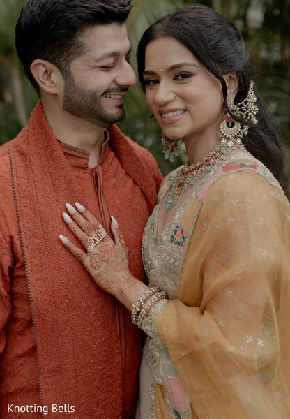 Couple in Rust Kurta and Ornate Bridal Earrings