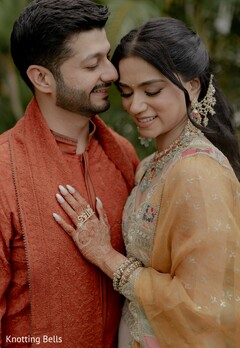 Couple's Portrait with Intricate Bridal Jewelry and Mehndi