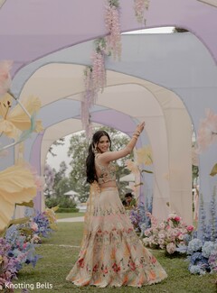 Pastel Floral Lehenga with Whimsical Archway Decor