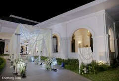 Elegant Draped Entrance with White Florals