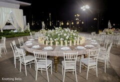 Round Reception Table with White Floral Centerpiece and Candles