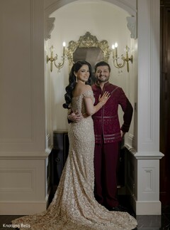 Glamorous Couple Portrait in Gold and Burgundy Attire
