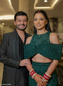 Couple in Emerald Green Halter Neck Top and Textured Suit Jacket