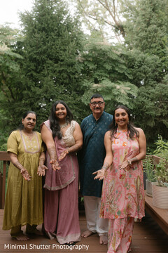 Family Poses with Mehndi Designs Outdoors