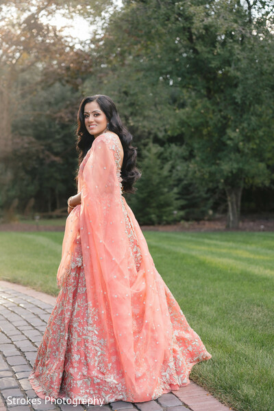 peach lehenga,outdoor portrait,embroidered lehenga,lehenga,portraits,elegant,woman