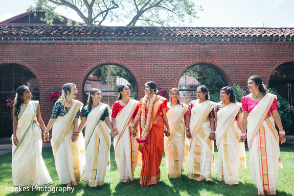 bridal party,saree,orange saree,kerala kasavu saree,bridesmaids,traditional attire,outdoor portrait,wedding fashion,group photo