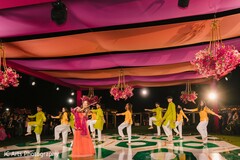 Sangeet Dance Performance Under Pink and Orange Fabric