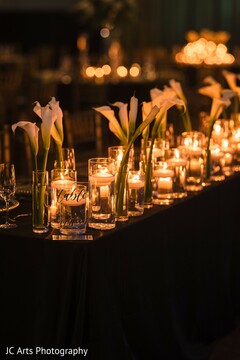Warm Candlelit Reception Table with Elegant Calla Lily Centerpieces