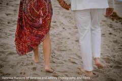 Barefoot Beach Stroll: Intricate Red Print Attire & White Pants