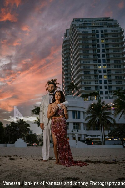 south asian wedding,beach wedding,sunrise,red lehenga,white suit,couple portrait