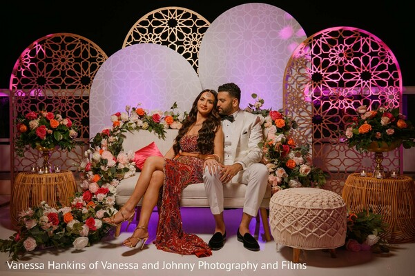 couple,portrait,floral decor,lounge area,decorative arches,wedding decor,elegant setting