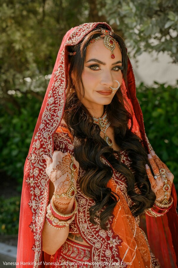 bridal portrait,red lehenga,bridal jewelry,mehndi,maang tikka,bridal fashion,wedding inspiration,bride,nose ring,bridal makeup,wedding photography,south asian bride