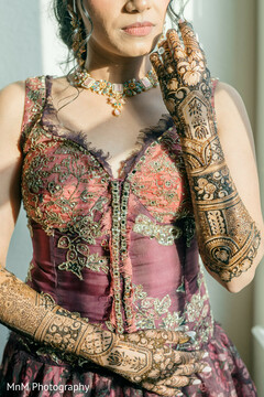 Intricate Bridal Mehndi Adorned with Beaded Choker