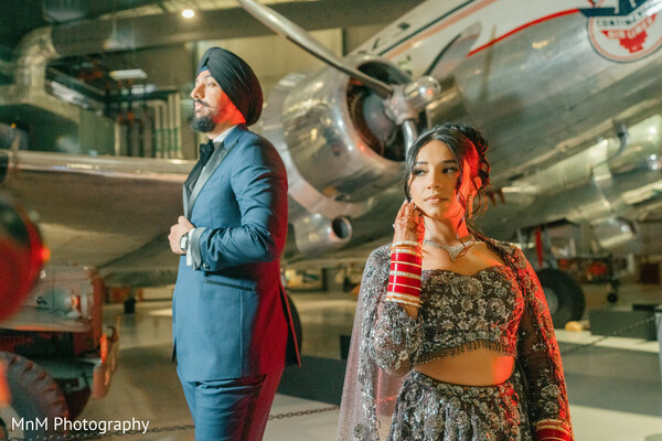 Chic Couple's Portrait with Vintage Airplane Backdrop