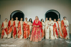 Bride in Red Lehenga with Her Bridal Party