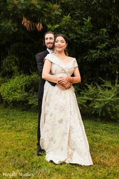 Elegant Couple's Portrait: Ivory Brocade Gown & Classic Black Suit