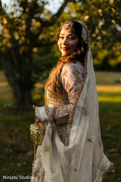 Golden Hour Bridal Portrait with Intricate Gold Embellishments
