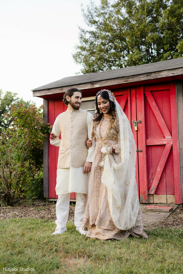 couple portrait,cream lehenga,beige wedding dress,cream sherwani,groom attire,bridal gown,wedding fashion,outdoor photo