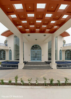 Grand Entrance with Terracotta Ceiling and Blue Doors