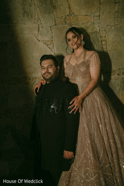 Couple Poses in Embellished Kurta and Sparkling Gown