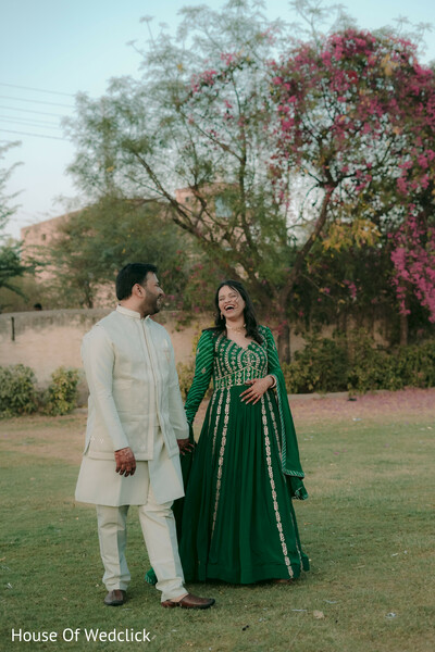 Couple in Emerald Green Anarkali and Ivory Kurta Set with Nehru Jacket