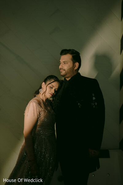Couple in Formal Attire with Subtle Lighting