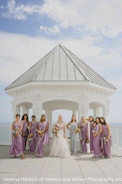 Bride and Bridal Party Posing in Elegant Saris at an Outdoor Gazebo