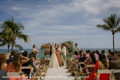 Oceanfront Wedding Ceremony with Floral Aisle Decor