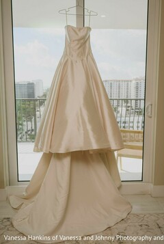 Ivory Wedding Gown Hanging with Balcony View
